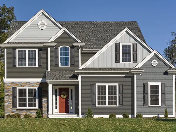 Home with gray CertainTeed Restoration Classic siding