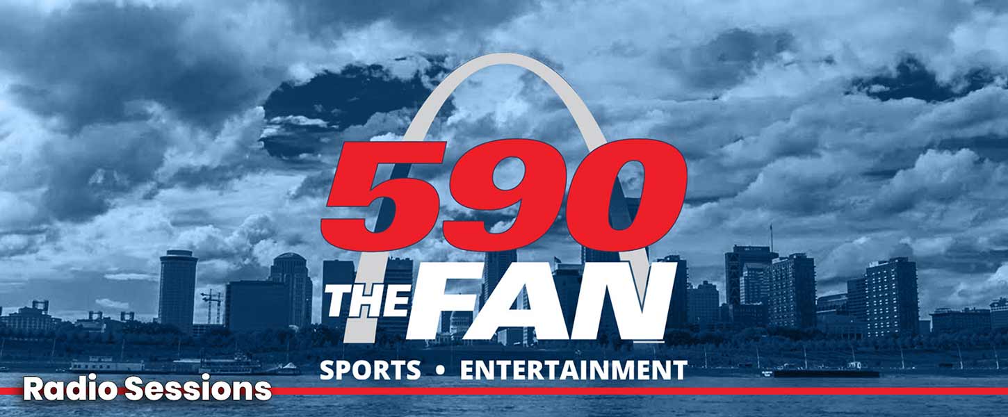 Banner with the local radio station '590 The Fan' logo in front of an urban city landscape